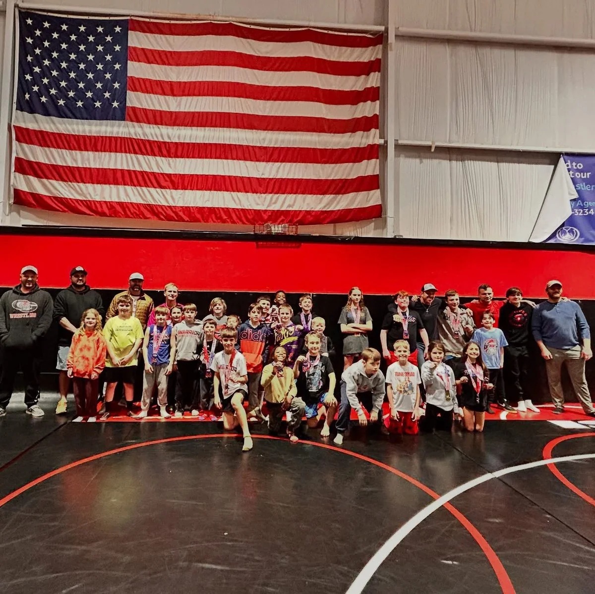 Warrior Wrestling Club academy logo