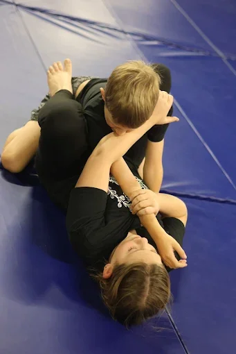 Kombative Concepts Martial Arts (KCMA) academy logo