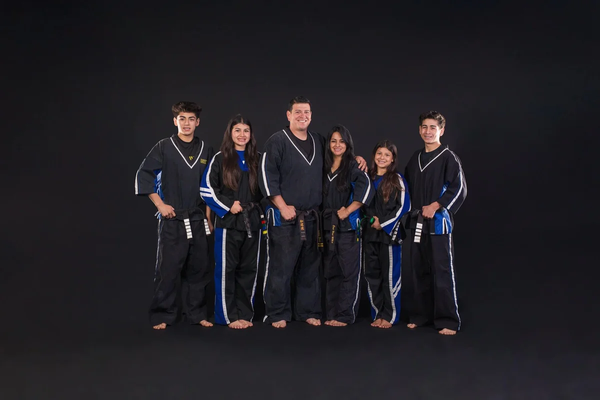 East West MMA academy logo