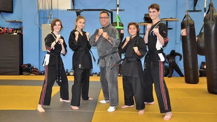 Ultimate Martial Arts Centers / Zuma Dojo academy logo