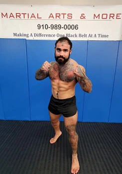 Ultimate Fighting MMA Brazilian Jiu-Jitsu Wrestling Kickboxing Judo Sambo Muay Thai Vale Tudo Boxing Submission Grappling Mixed Martial Arts Training Denver academy photo
