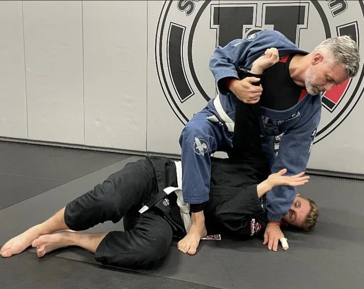 University of Ground Fighting (UofGF) academy logo