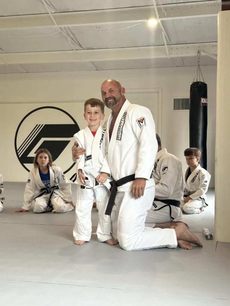 Momentum Jiu Jitsu academy logo