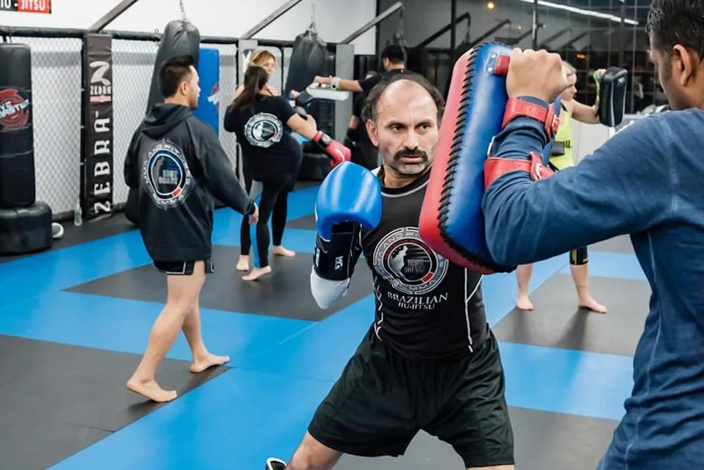 East Coast MMA & Fitness academy logo